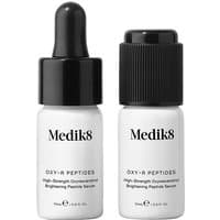 Medik8 Oxy-R Peptides serum set, two white bottles with black caps, one dropper and one screw cap, 10ml each.