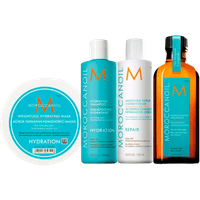 Moroccanoil hair care set with hydrating mask, shampoo, conditioner, and treatment oil in turquoise and white packaging.