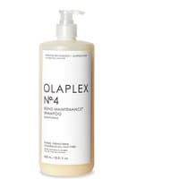 Olaplex No.4 Bond Maintenance Shampoo 1000ml, beige bottle with pump dispenser and black text.