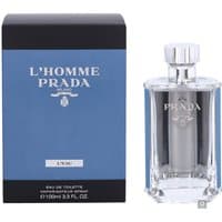 Clear glass bottle with silver cap and blue label, next to a blue and black Prada L'Homme L'Eau box, 100ml.