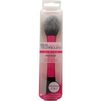 Pink-handled Real Techniques blush brush with fluffy gray bristles in clear packaging.
