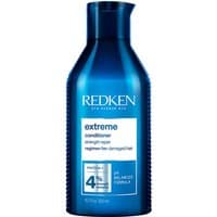 Blue bottle of Redken Extreme Conditioner 300ml with white label and black cap.