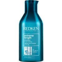 Blue bottle of Redken Extreme Length Shampoo 300ml with white text and a flip-top cap.