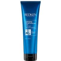 Blue tube of Redken Extreme Strength Builder Plus Mask 250ml with white text and black cap.