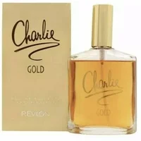 Revlon Charlie Gold Eau De Toilette 100ml, clear glass bottle with gold cap, matching gold box with black script.
