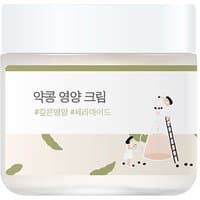 Round Lab Soybean Nourishing Cream 80 ml, white jar with green accents and illustrated figures on the label.