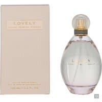 Clear glass bottle of Sarah Jessica Parker Lovely Eau de Parfum with gold cap, next to pink box with gold lettering.