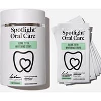 Spotlight Oral Care 7 Day Ultra Teeth Whitening Strips, white container with tooth logo, individual strip packets.