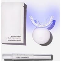 Spotlight Oral Care LED Teeth Whitening Kit with whitening strips, LED mouthpiece, and whitening pen in sleek packaging.