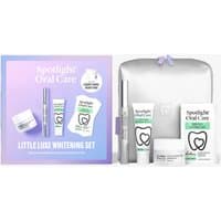 Spotlight Oral Care Little Luxe Whitening Gift Set with toothpaste, whitening strips, and silver travel case.