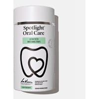 Spotlight Oral Care Ultra Teeth Whitening Strips box with tooth design and green label.