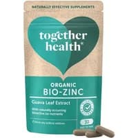 Together Health Bio Zinc Vegicaps in beige pouch with green heart logo and guava leaf extract label, 30 capsules.