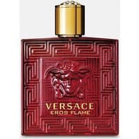 Red Versace Eros Flame perfume bottle with gold cap, Medusa logo, and geometric pattern, 100ml.