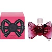 Pink Viktor & Rolf Bonbon Eau de Parfum 50ml bottle shaped like a bow, next to matching pink box with black ribbon design.