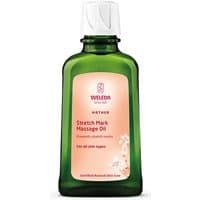 Green glass bottle of Weleda Stretch Mark Massage Oil 100ml with white cap and peach label.