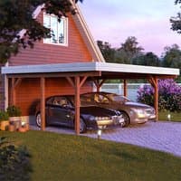 Wooden carport with flat roof, natural finish, fits two cars, attached to a house, surrounded by greenery.