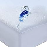 White waterproof mattress protector with terry top, blue liquid spill, and extra deep stretch skirt for single bed.