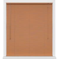 Wooden Venetian blinds in cherry color with white frame and pull cords on the left side.