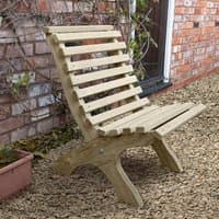 Curved wooden garden chair with slatted back and seat, natural finish, set on gravel near brick wall and planter.