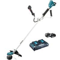 Makita brushless brush cutter with blue motor housing, dual handles, and two 18V batteries with charger.
