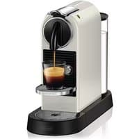 White Nespresso Citiz by De'Longhi coffee machine with sleek design and black accents, brewing espresso into a glass cup.