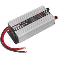Sealey PSI1000 12V DC 1000W power inverter, silver with ribbed casing, black and red cables, pure sine wave design.