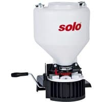 White Solo 421 granulate spreader with a black base, red accents, and a side crank handle.