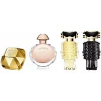 Paco Rabanne Miniature Feminine Travel Set with four distinct perfume bottles in gold, pink, yellow, and black designs.