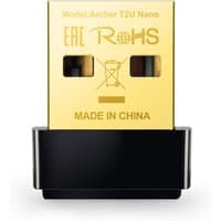 Black and gold TP-Link AC600 Nano Wireless USB WiFi Adapter with compact design and "Made in China" text.
