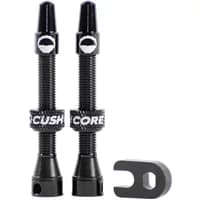 Black Cushcore tubeless air valves, 44mm, with logo bands, knurled tops, and a small black valve tool.
