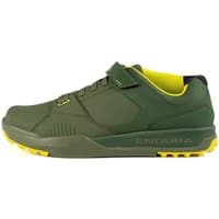 Green Endura MT500 Burner Clipless MTB shoes with yellow soles, Velcro strap, and reinforced toe.
