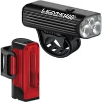 Black Lezyne bike light set with ribbed design, featuring a front light with four LEDs and a red rear light.