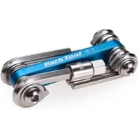 Blue Park Tool IB-2 I-Beam mini fold-up tool with hex wrenches, screwdriver, and star wrench, compact design.
