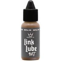 Black bottle of Peatys LinkLube Wet chain lubricant with a pointed cap and white text on a gray label.