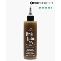Brown Peaty's LinkLube Wet Lube bottle with black cap and pointed nozzle, white text and crown logo.