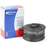 Schwalbe 700c inner tubes, black rubber, coiled beside blue and white Schwalbe branded box.