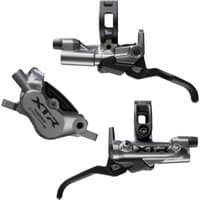 "Shimano XTR 4 Pot Bled Brake Levers and Callipers Set, sleek silver and black design with XTR logo, front and rear"