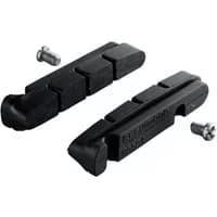 Black Shimano BR9000 R55C4 cartridge brake inserts with grooved surface and included screws.