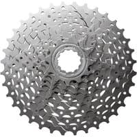 Silver Shimano CS-HG400 Alivio 9-speed cassette with multiple sprockets and intricate gear teeth design.