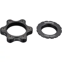 Black Shimano Deore disc brake rotor adapter with 6-bolt pattern and CENTER LOCK hub ring.