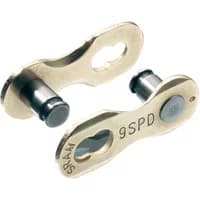 Gold SRAM Powerlink 9-speed chain connectors with oval slots and engraved "9SPD" text.
