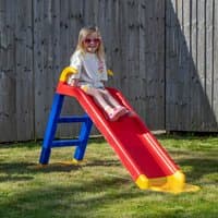 Red and yellow plastic slide with blue ladder, 80cm tall, suitable for kids, set on grass in a backyard.