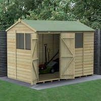 Wooden shed with green roof, double doors, shiplap cladding, and two windows, set on a concrete base.