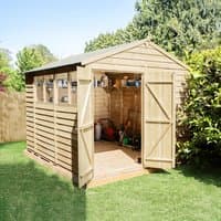 Wooden shed with double doors, apex roof, and side windows, set in a garden.