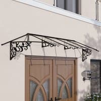Black metal and clear polycarbonate large door canopy with ornate side brackets and sloped roof design.