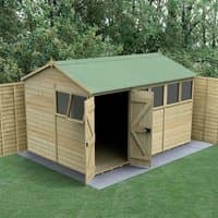 Wooden shed with green roof, double doors, windows, and tongue and groove panels, set on a concrete base.