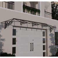 Black Palram Canopia Lily 4700 door canopy with ornate brackets and clear roof panels over double doors.