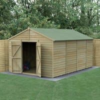 Wooden shed with double doors, apex roof, pressure-treated overlap panels, windowless, set in a grassy area.