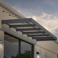 Grey Palram Canopia Sophia XL door canopy with clear panels and metal frame, mounted above a glass door.