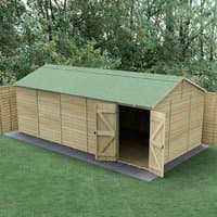 Wooden windowless shed, 20' x 10', reverse apex roof, double doors, pressure-treated timber, set on grass.